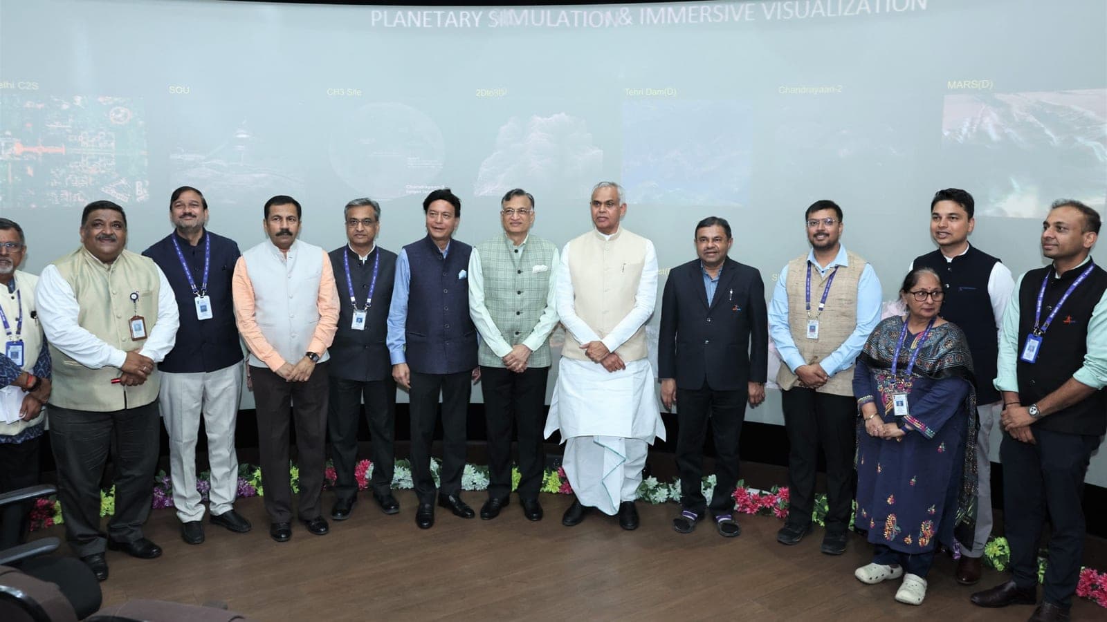 The 8X delegation with the Governor of Gujarat in the Planetary Simulation & Immersive Visualization facility at ISRO's Space Applications Centre, February 2026.